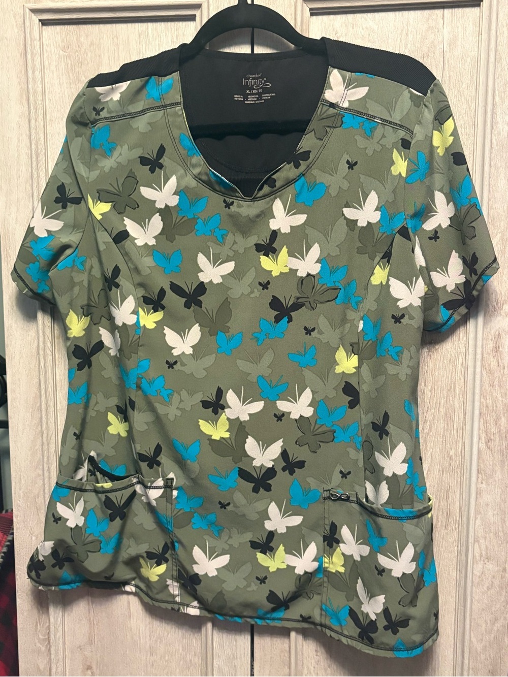 Cherokee Olive Butterfly Print Scrub Top with Blue & Yellow Accents